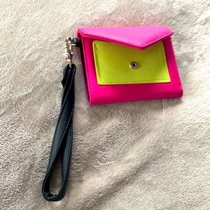 Neon pink and yellow small wallet with strap.
